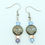 Thumbnail: Czech Glass Moon Face Dangle Earrings
