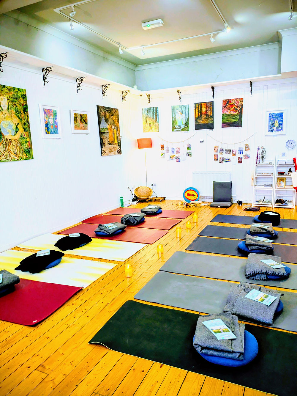 A view of the back of the studio space with beautiful artwork enhancing the calm vibe of the space.