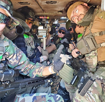 Players riding in a Spartan APC