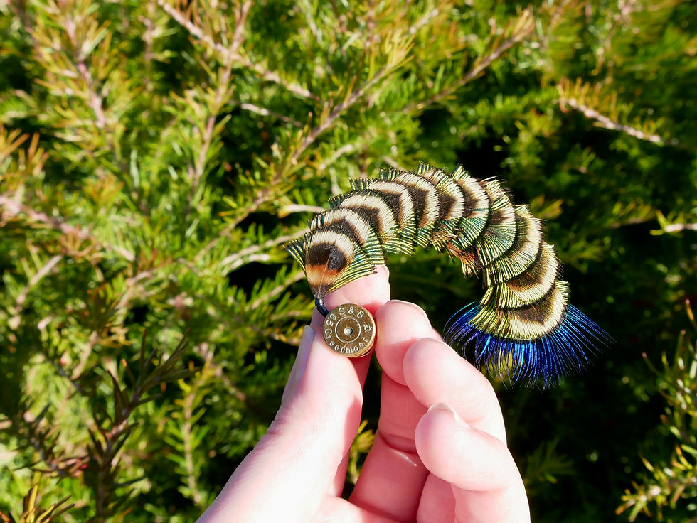 Thumbnail: Iridescent Peacock Shell Arched Feather Hat Pin In Hand For Size