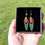 Thumbnail: Green Parrot Feather Topped With Chocolate Hen Pheasant Feather In Presentation Box