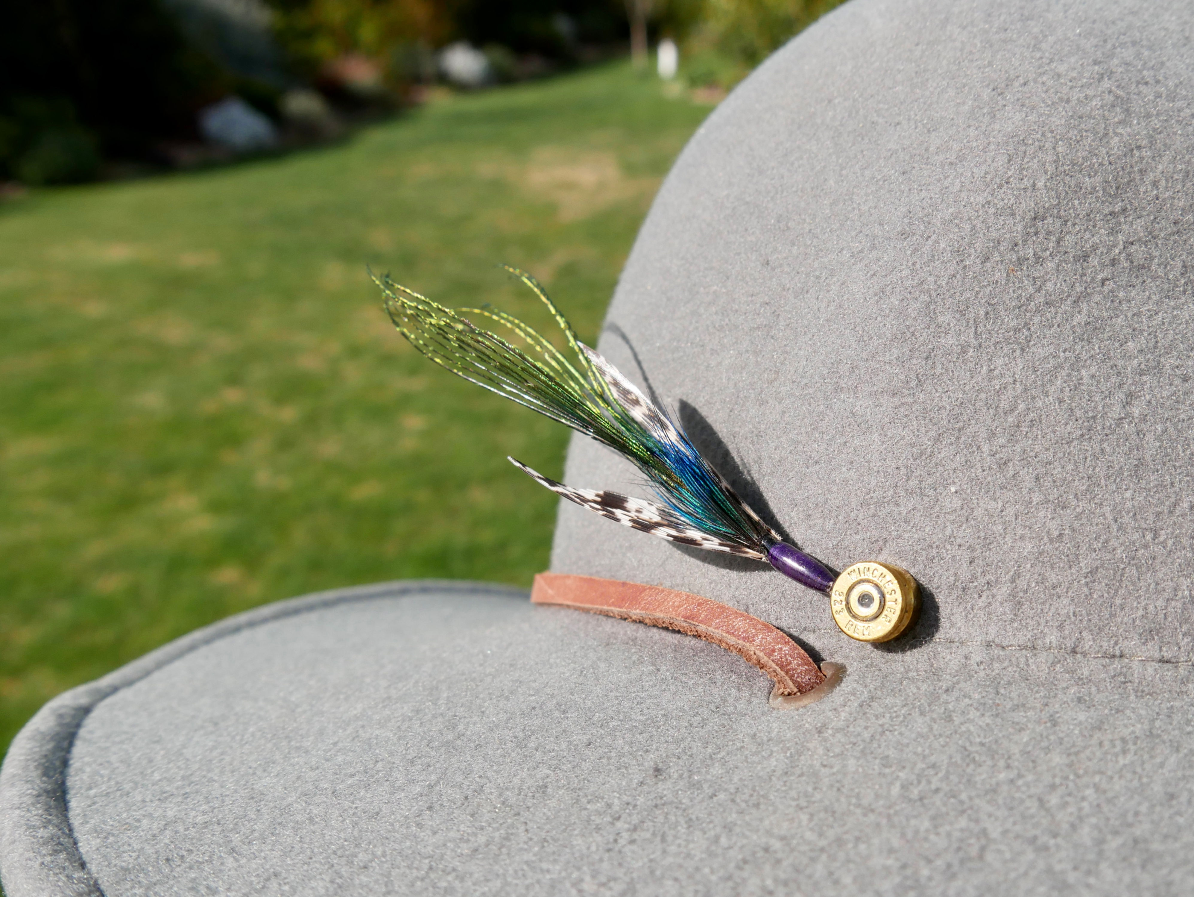 Winged Peacock Feather Hat Pin On Hat