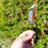 Thumbnail: Vibrant Blue Mallard and Chestnut Rooster Feather Lapel Pin In Hand For Size