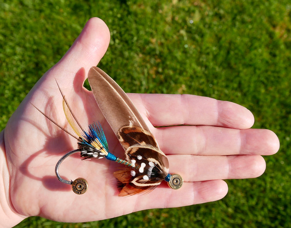 Thumbnail: Pheasant and guinea fowl 'salmon fly' style hat pin on hand for size