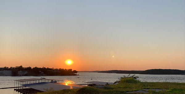 Sunset at lake of the ozarks breakaway boat rentals