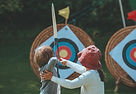 Mother & Child Shooting Arrows