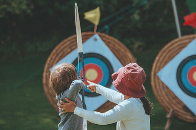 Mother & Child Shooting Arrows