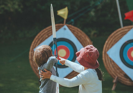 Mother & Child Shooting Arrows