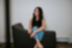 Kim Wylie, Counsellor, sitting in a comfortable chair in a welcoming office setting