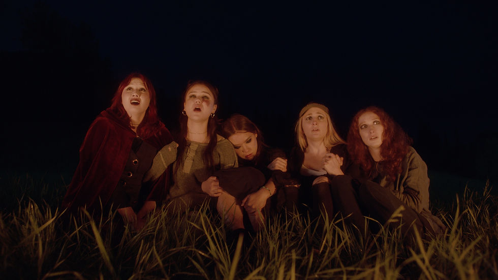 An image of a group of young women at a summer camp who star in the coming-of-age horror movie Camp.