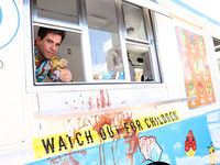 An image of director Eli Roth holding an ice cream cone to promote his movie The Ice Cream Man