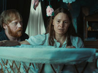 An image of Seidi Haarla as Saga and Rubert Grint as Jon in the movie Nightborn