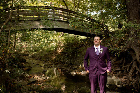 vogue portrait of the groom looking to the left