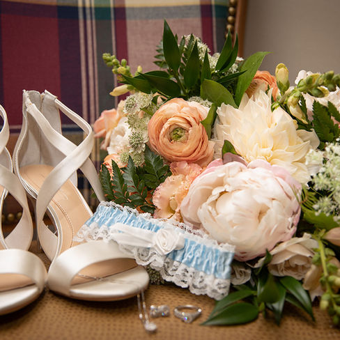bride's florals and shoes