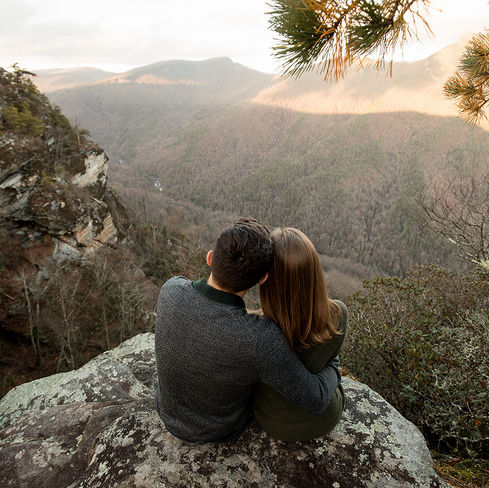 couple looking out at the linville gorge