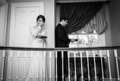 Bride and Groom reading each other's vows at Highgrove Estate in Raleigh, North Carolina