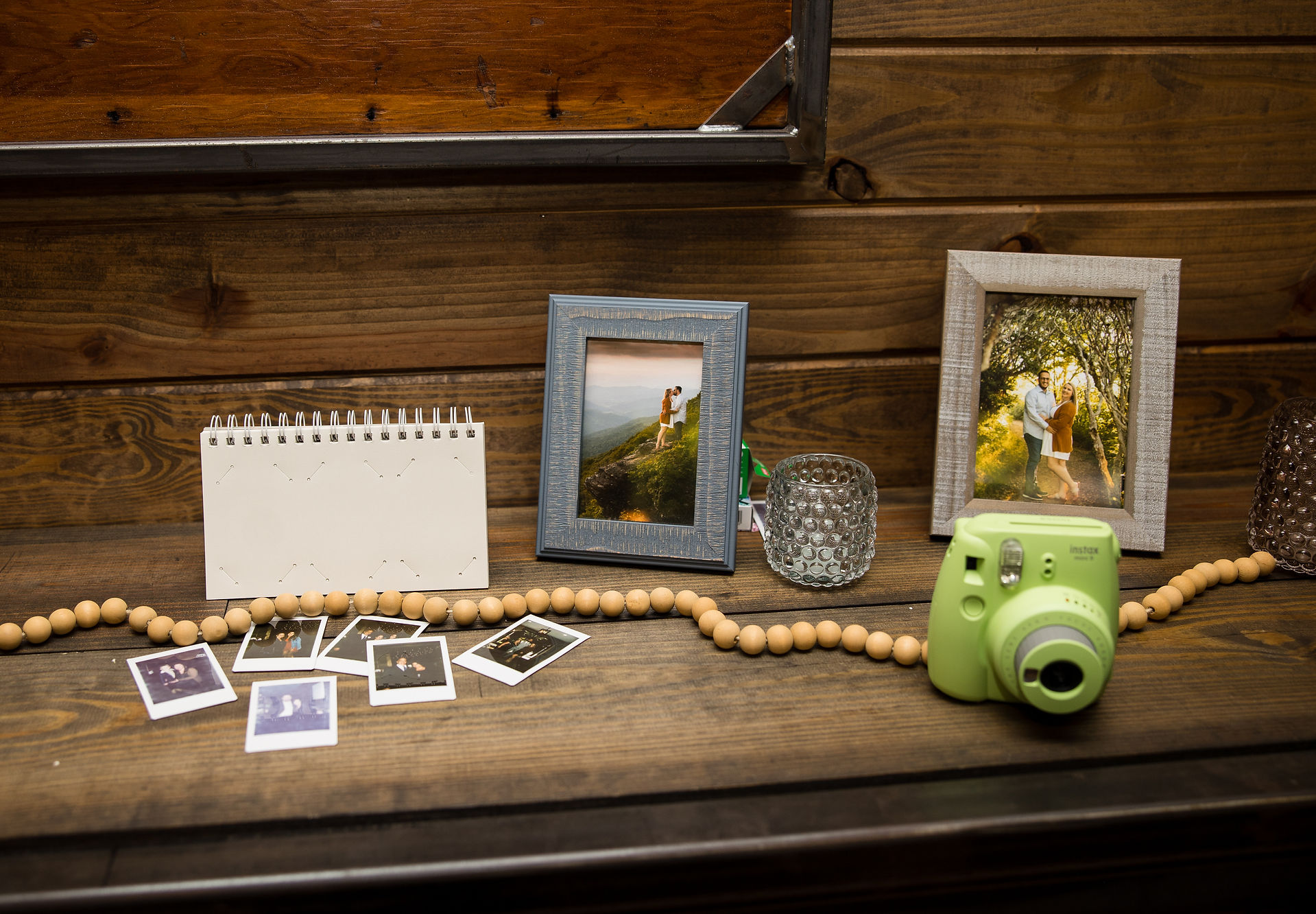 polaroids and pictures of the bride and groom 