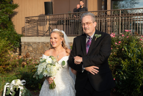 bride and groom walking down the aisle