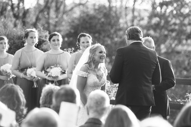 bride laughing at the groom