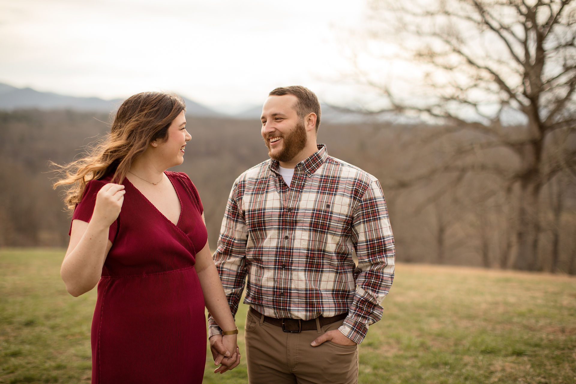 a man smiling at his fiance 