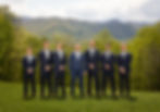 groomsmen portraits in front of the mountains