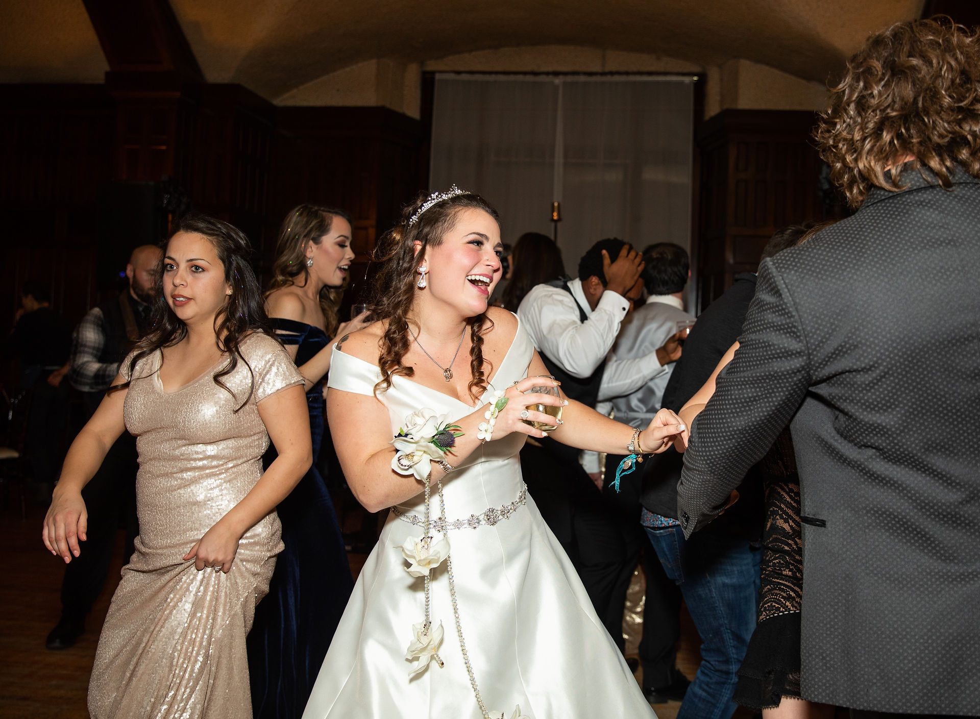 bride laughing while dancing 