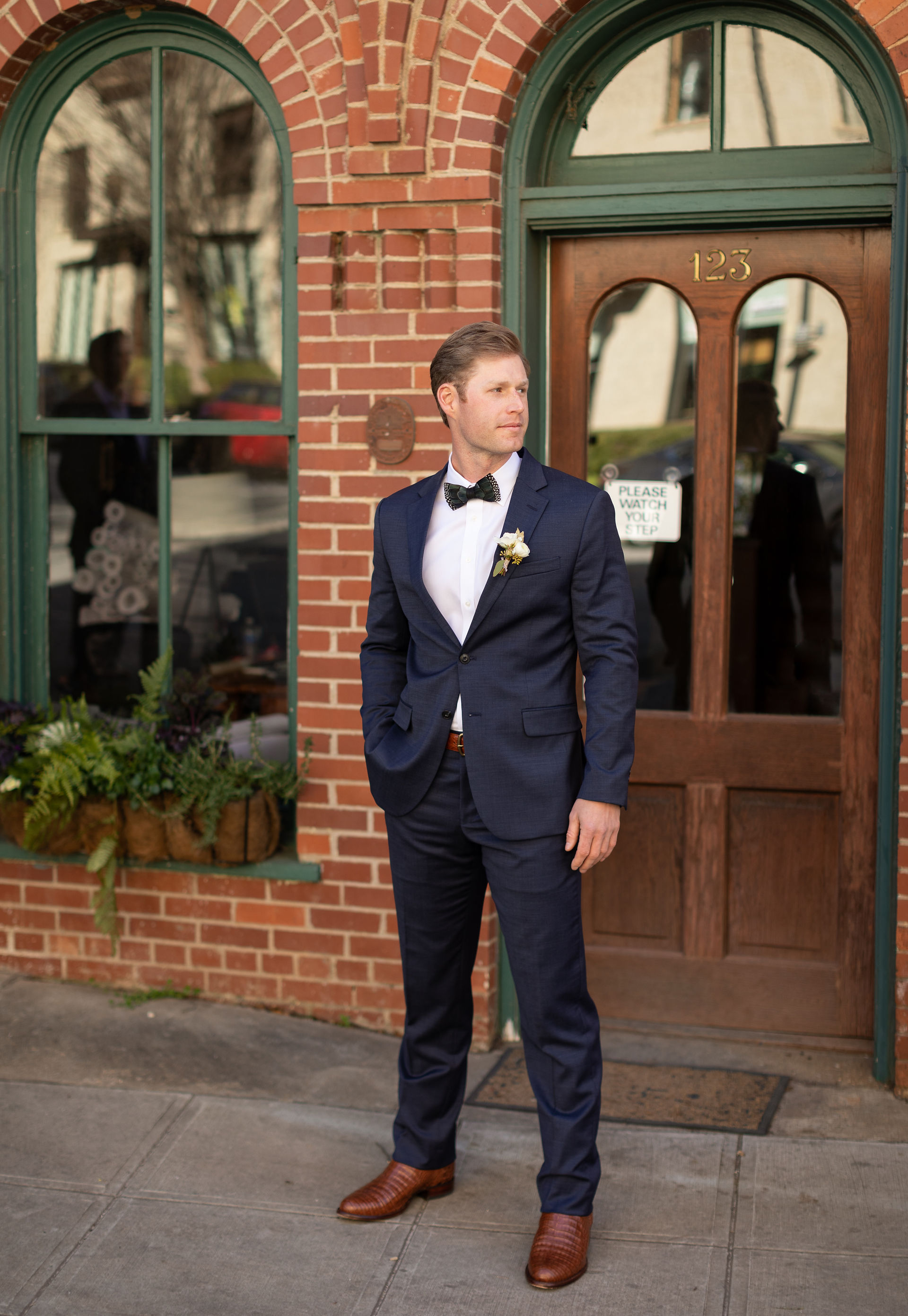 groom portrait looking off to the right 