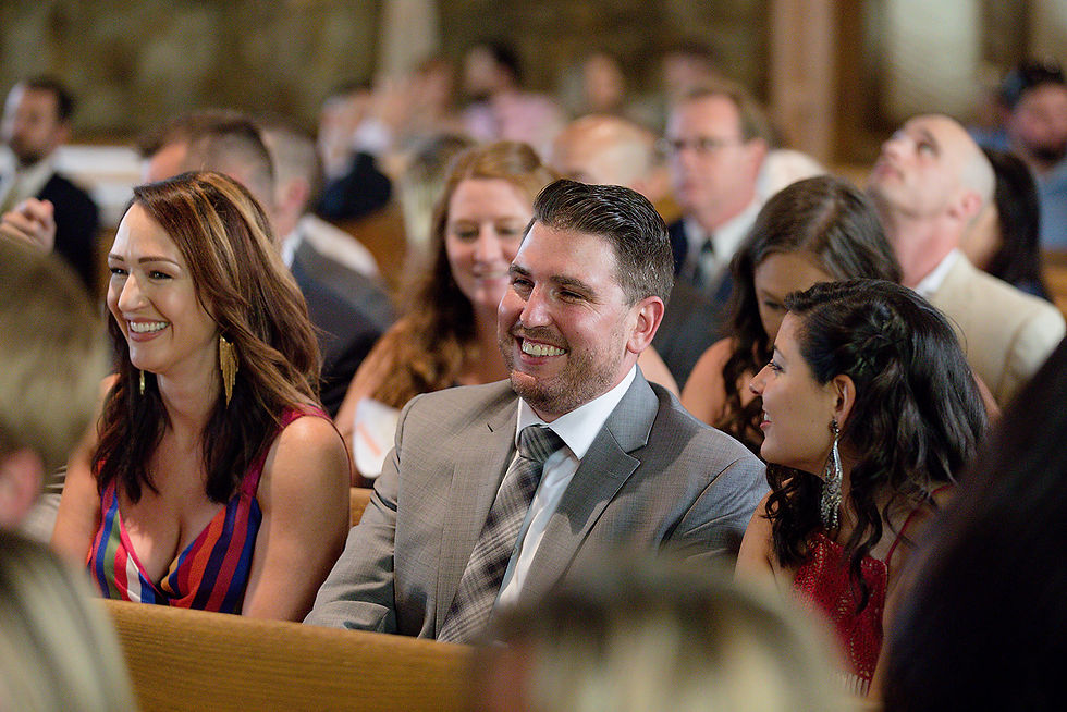 wedding guests laughing