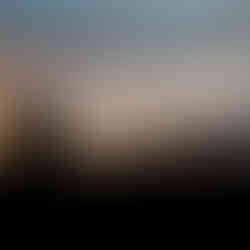 silhouette of a couple kissing during sunset