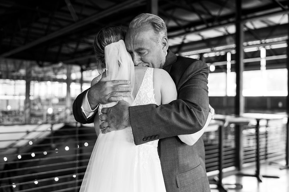 bride and her dad hugging