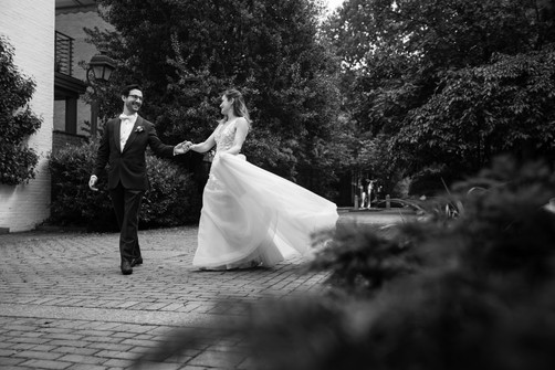 groom twirling bride