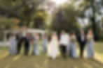 The bridal party walking together.