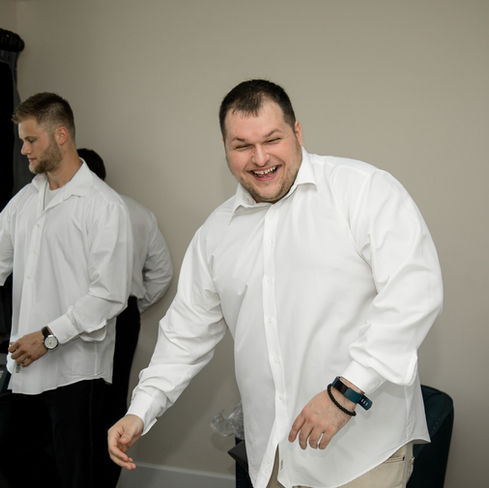groomsman laughing