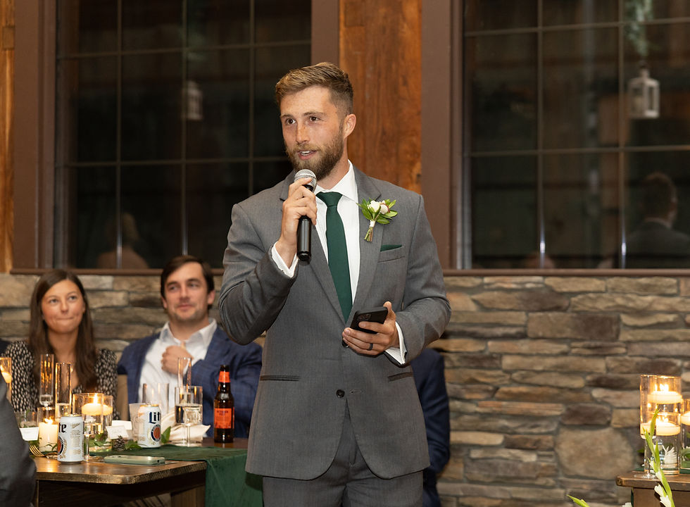 The best man giving his speech.