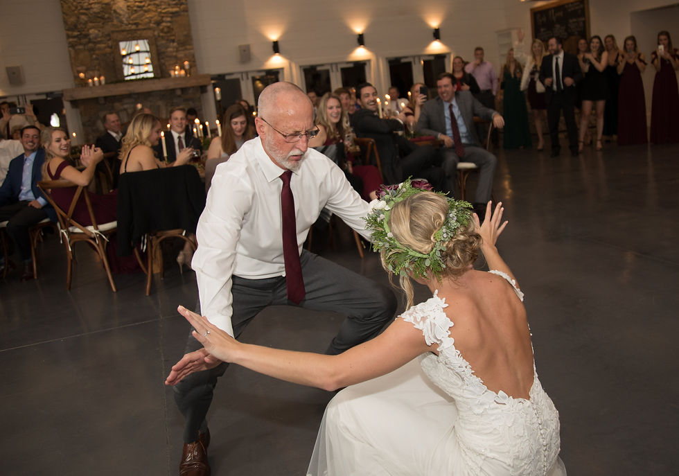 the bride and her dad dancing