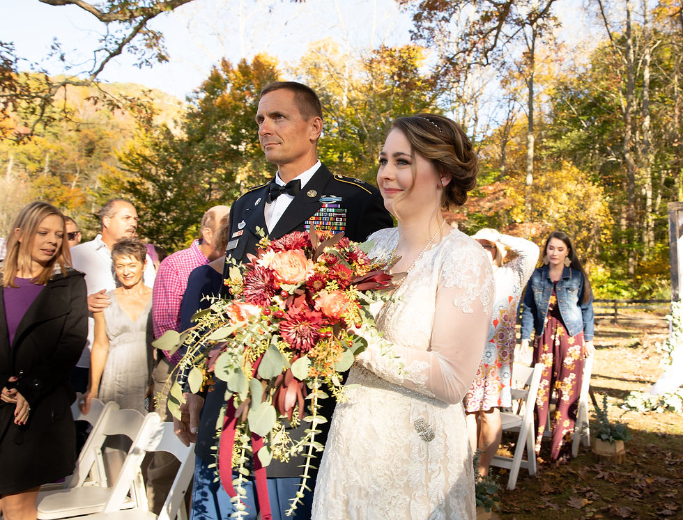 bride and her dad walking down the aisle