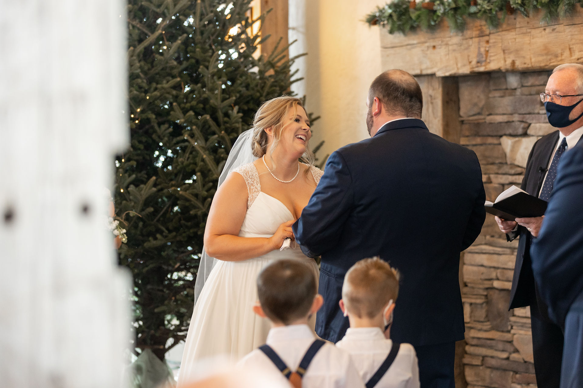 bride laughing during ceremony 