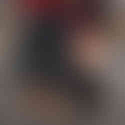 couple's legs sitting side by side