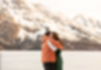 engaged couple hugging moments after their proposal