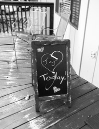 chalk sign with bride and groom's initials