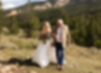 the bride's father walking her to the ceremony