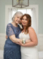 the bride and her grandmother hugging