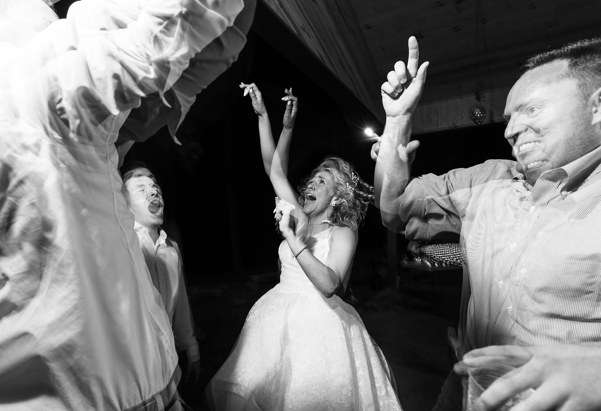 bride rocking out on the dance floor 