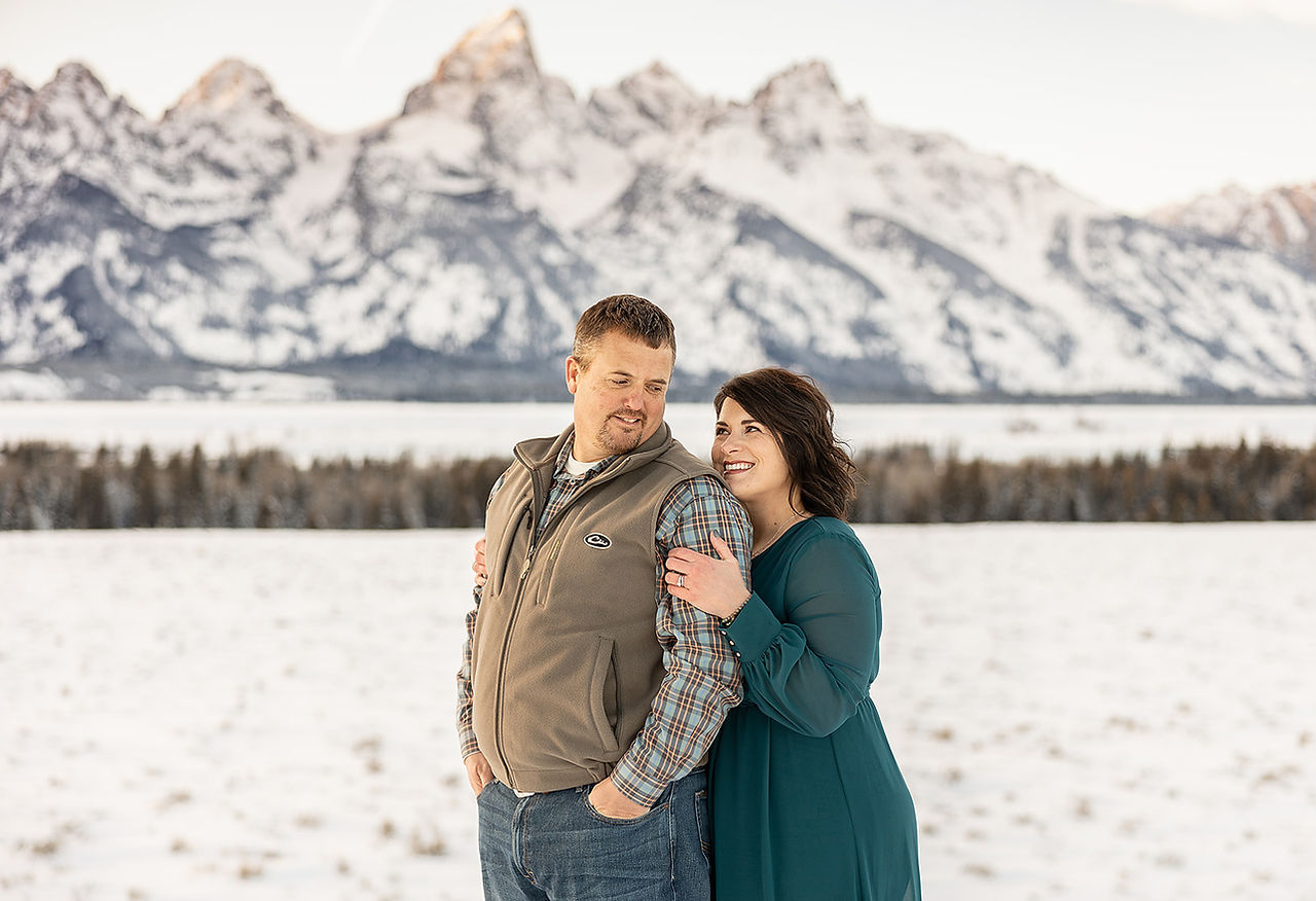 couple laughing together at glacier view turnout 