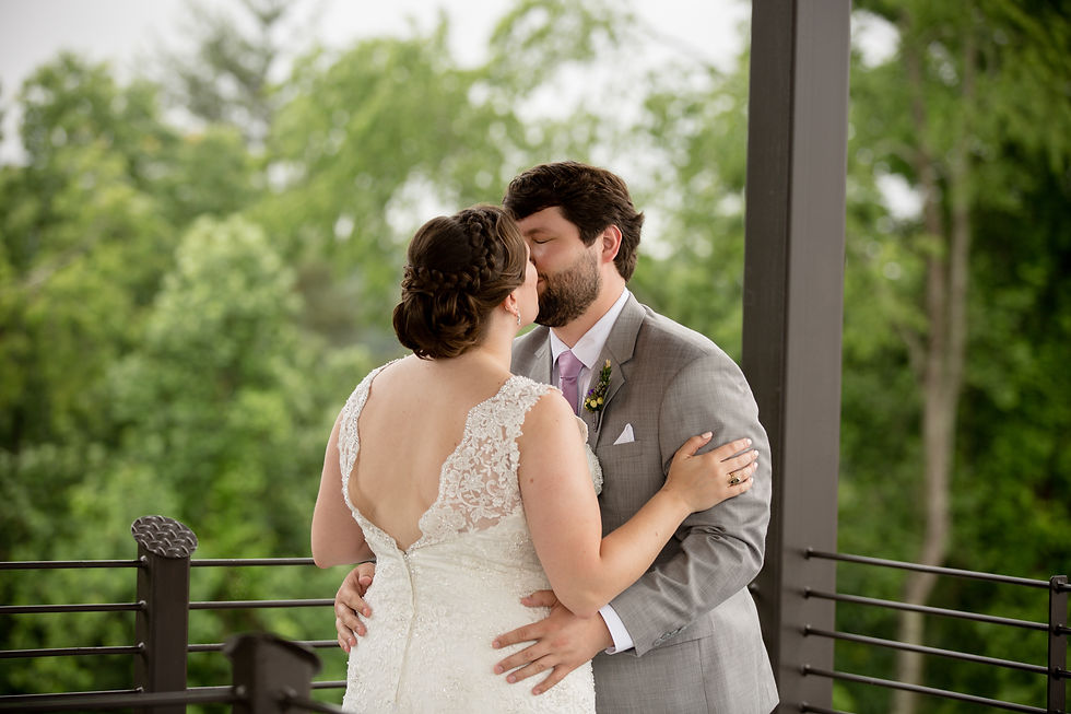 bride and groom kissing
