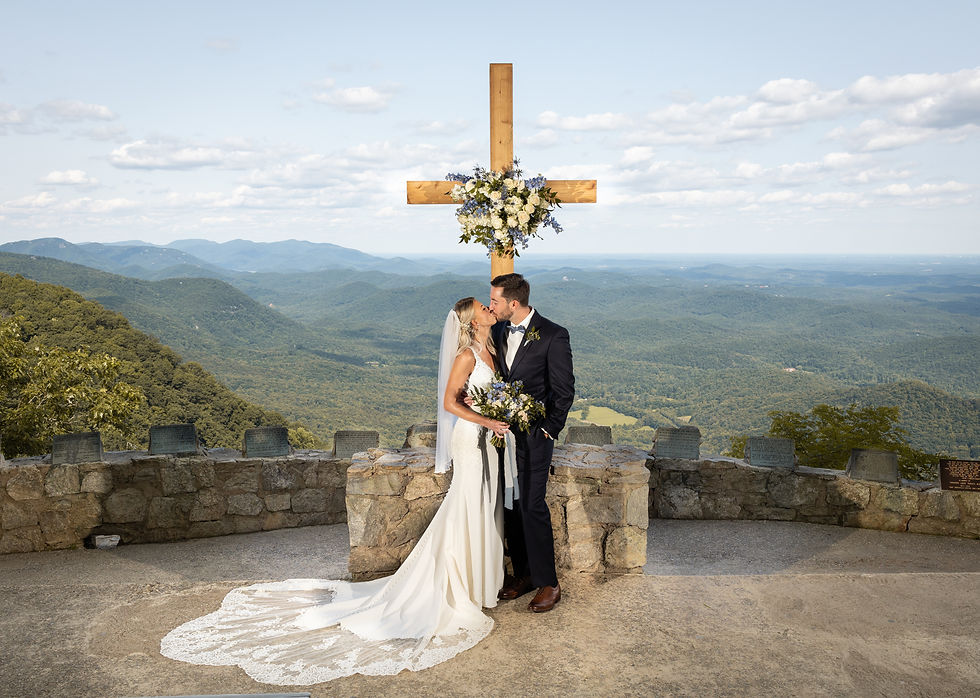bride and groom kissing at pretty place chapel