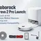 Roborock Qrevo 2 Pro robot vacuum and dock displayed with Qrevo replacement parts, including a main brush, side brush, filter and mop pad.