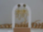 boucles d'oreilles fleur dorée