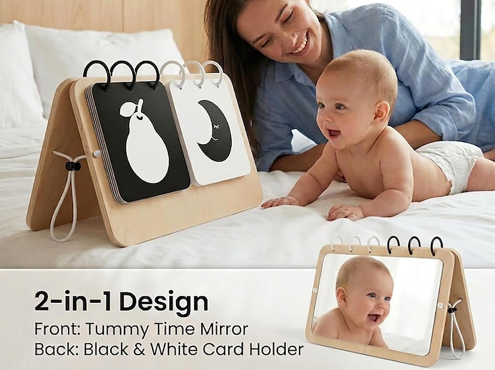Baby during tummy time with a favorite PT product mirror and cards.