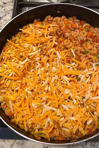 Topping with cheddar cheese